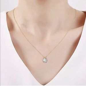 10k Gold Swarovski Zirconia Pendant
